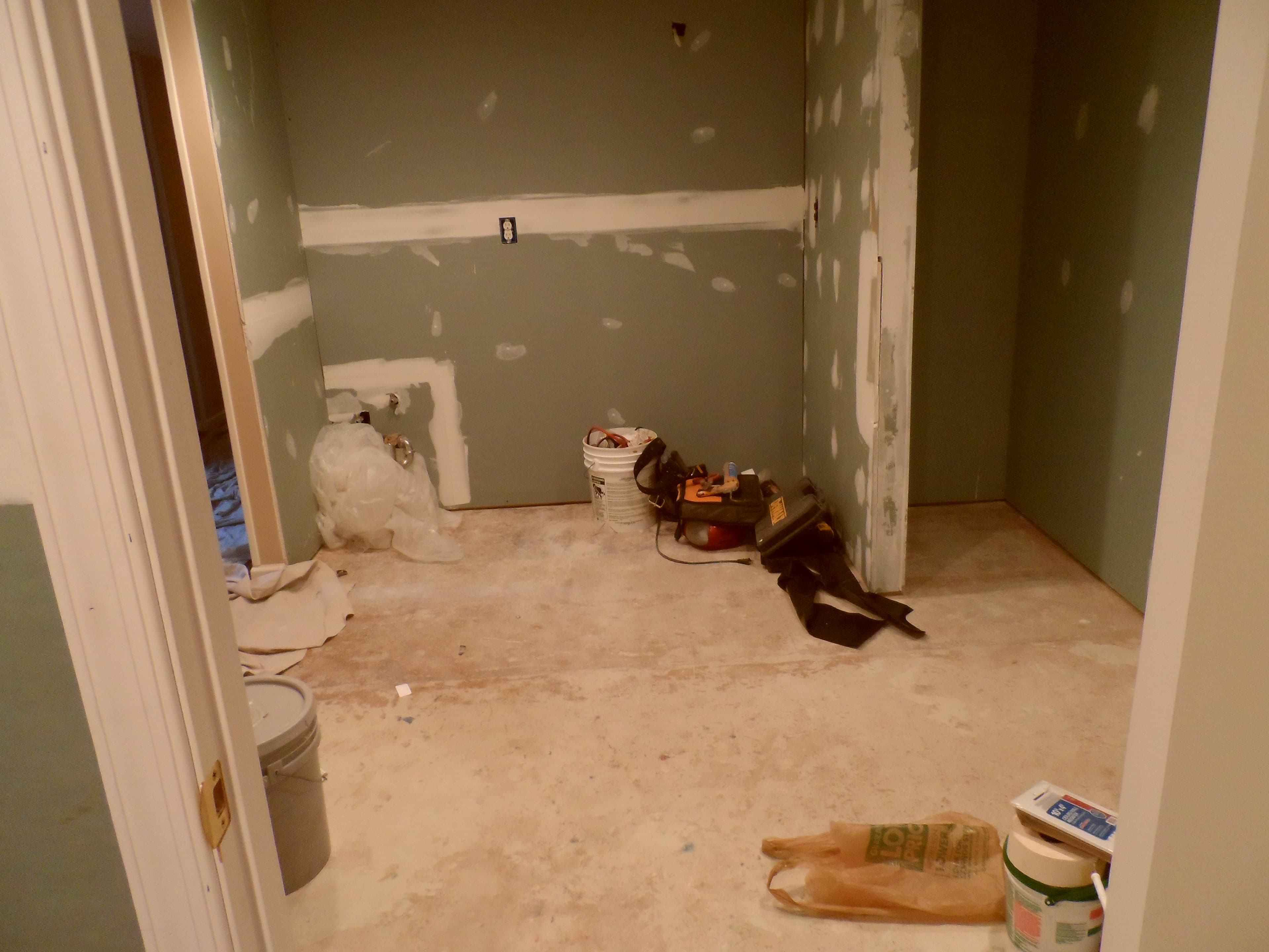 Basement room with kitchen before image 4