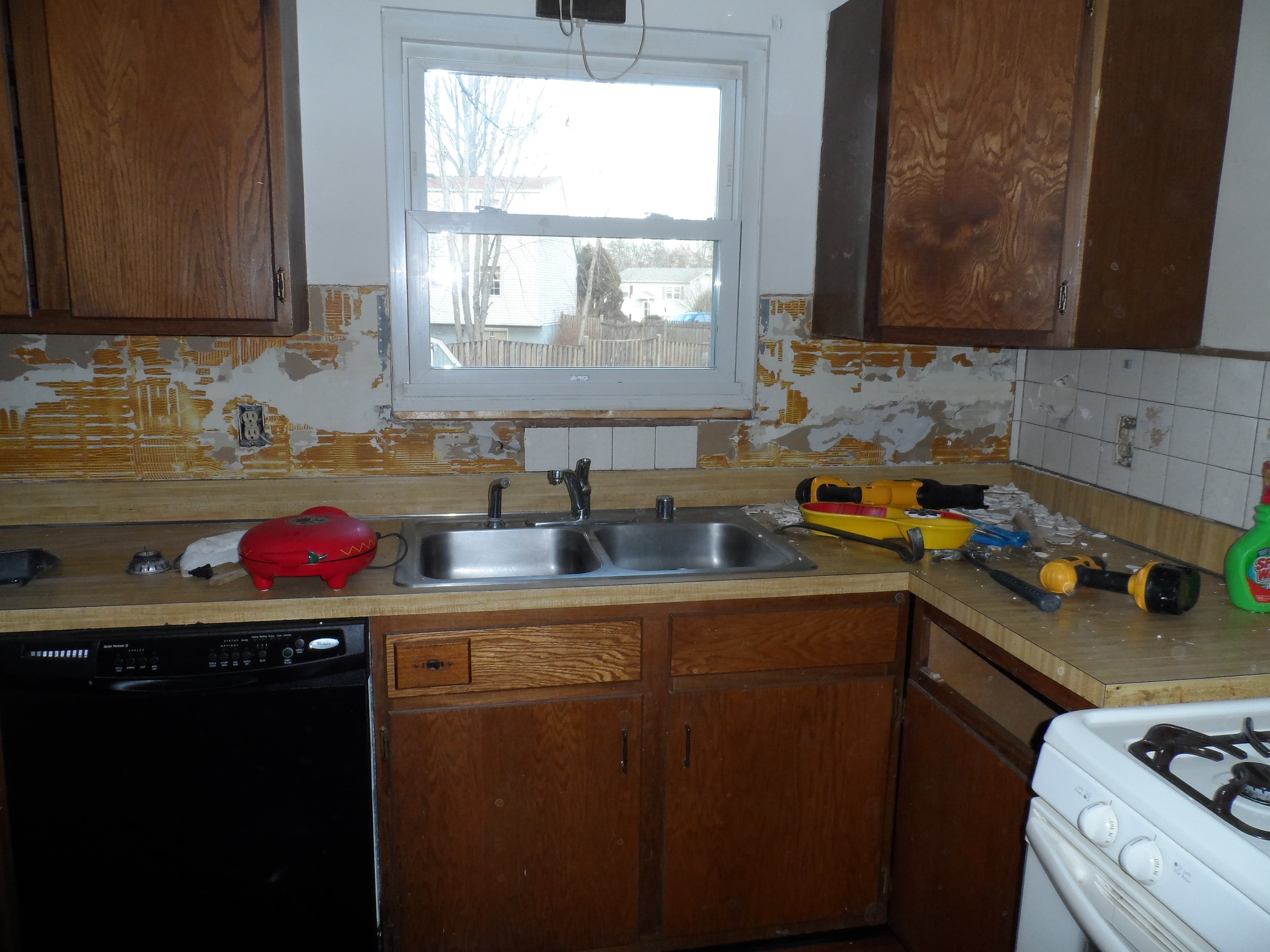 Installation of new kitchen cabinets before image 2