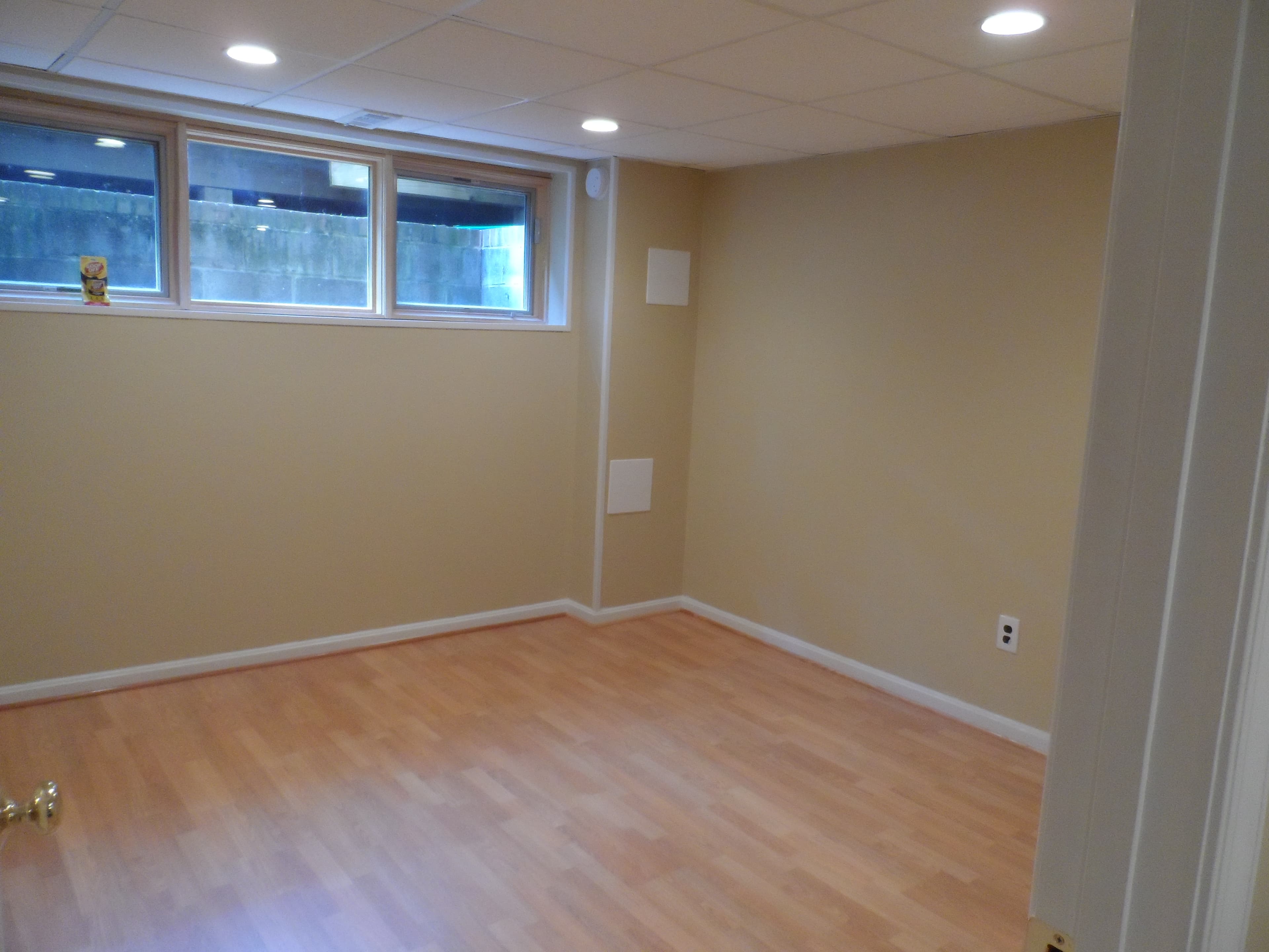 Pergo flooring in basement after image 1