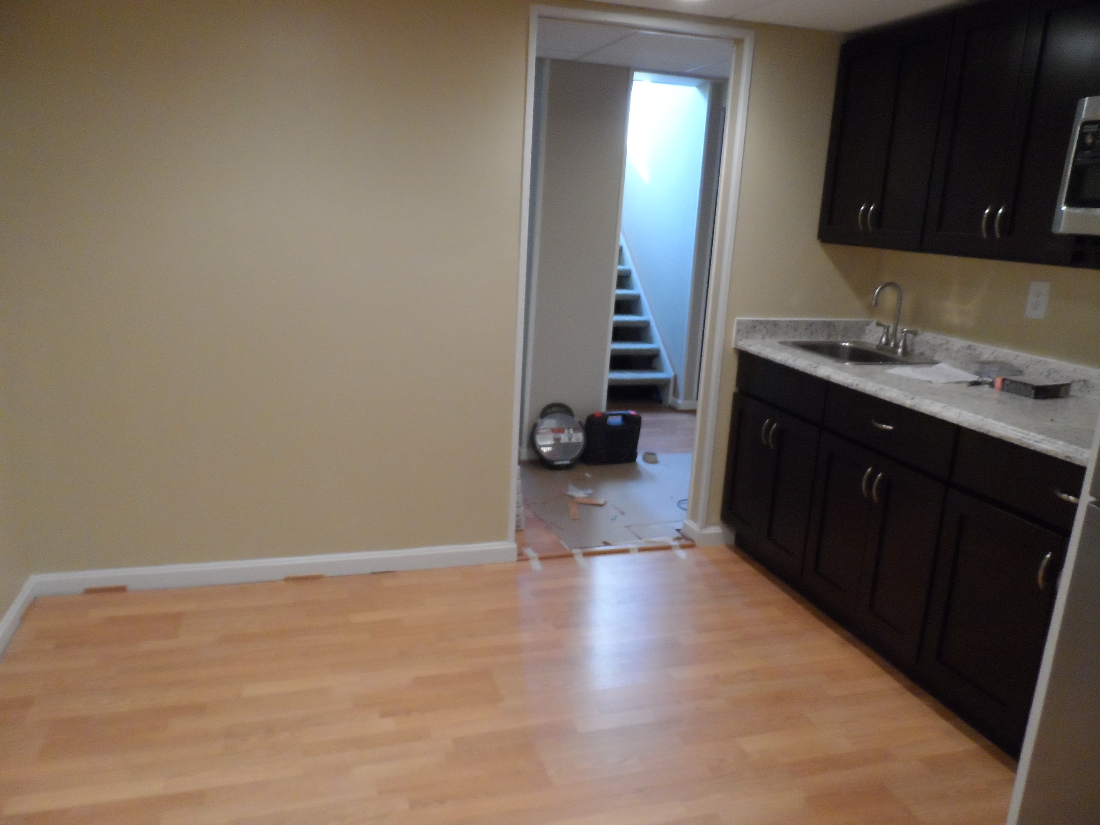 Pergo flooring in basement before image 3
