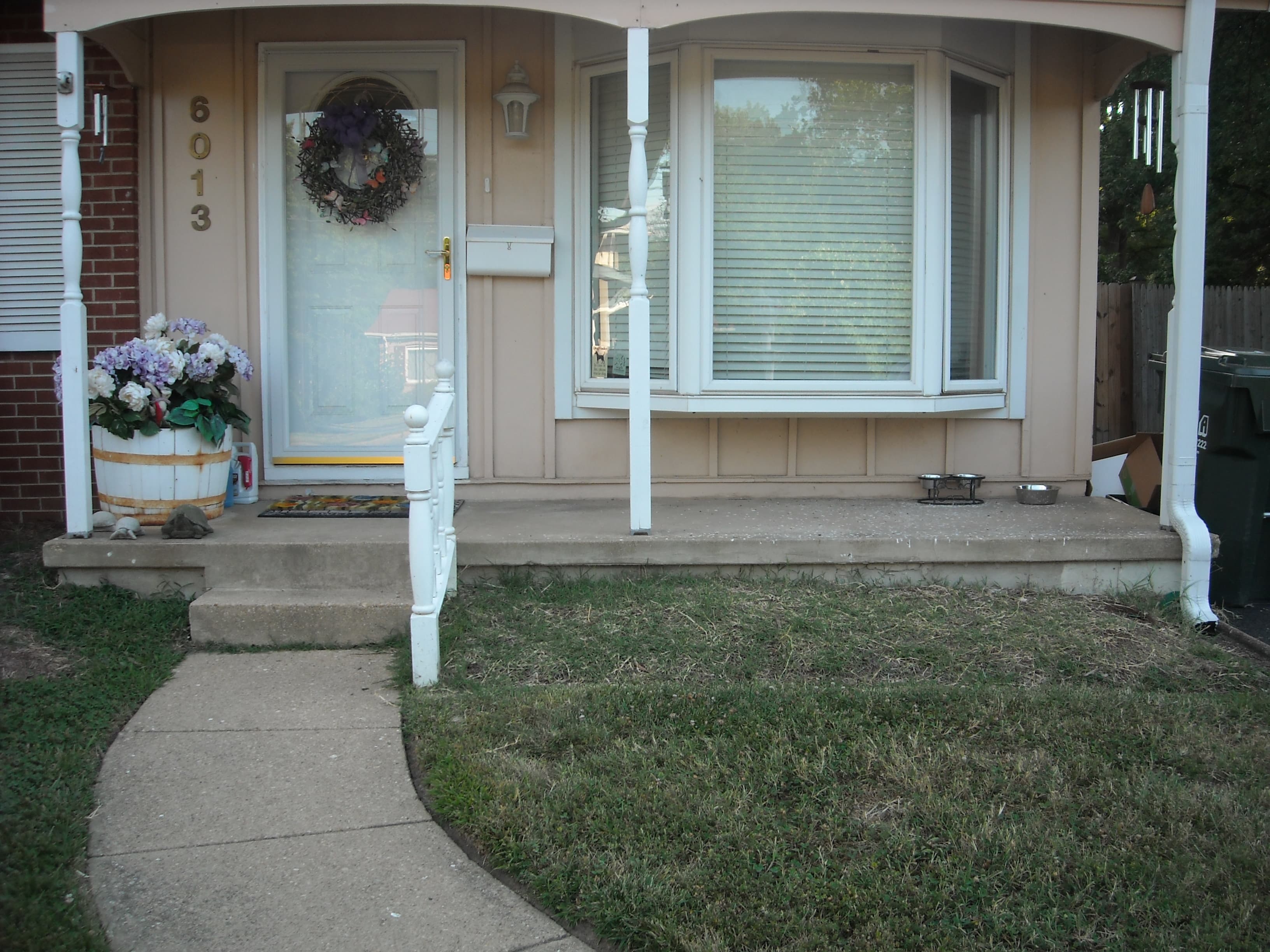 Porch and railing installation before image 1