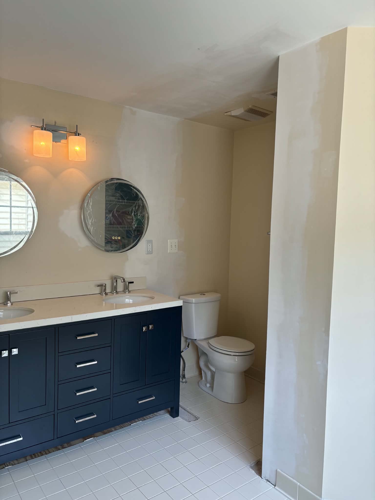 Wall removal and vanity upgrade after image 1